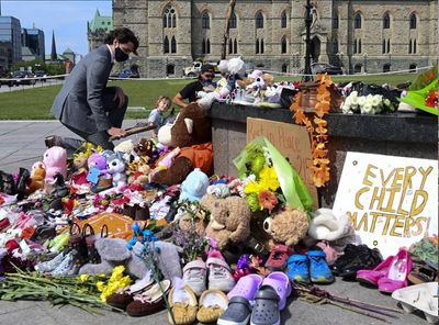 Prime Minister Trudeau paying respect to victims